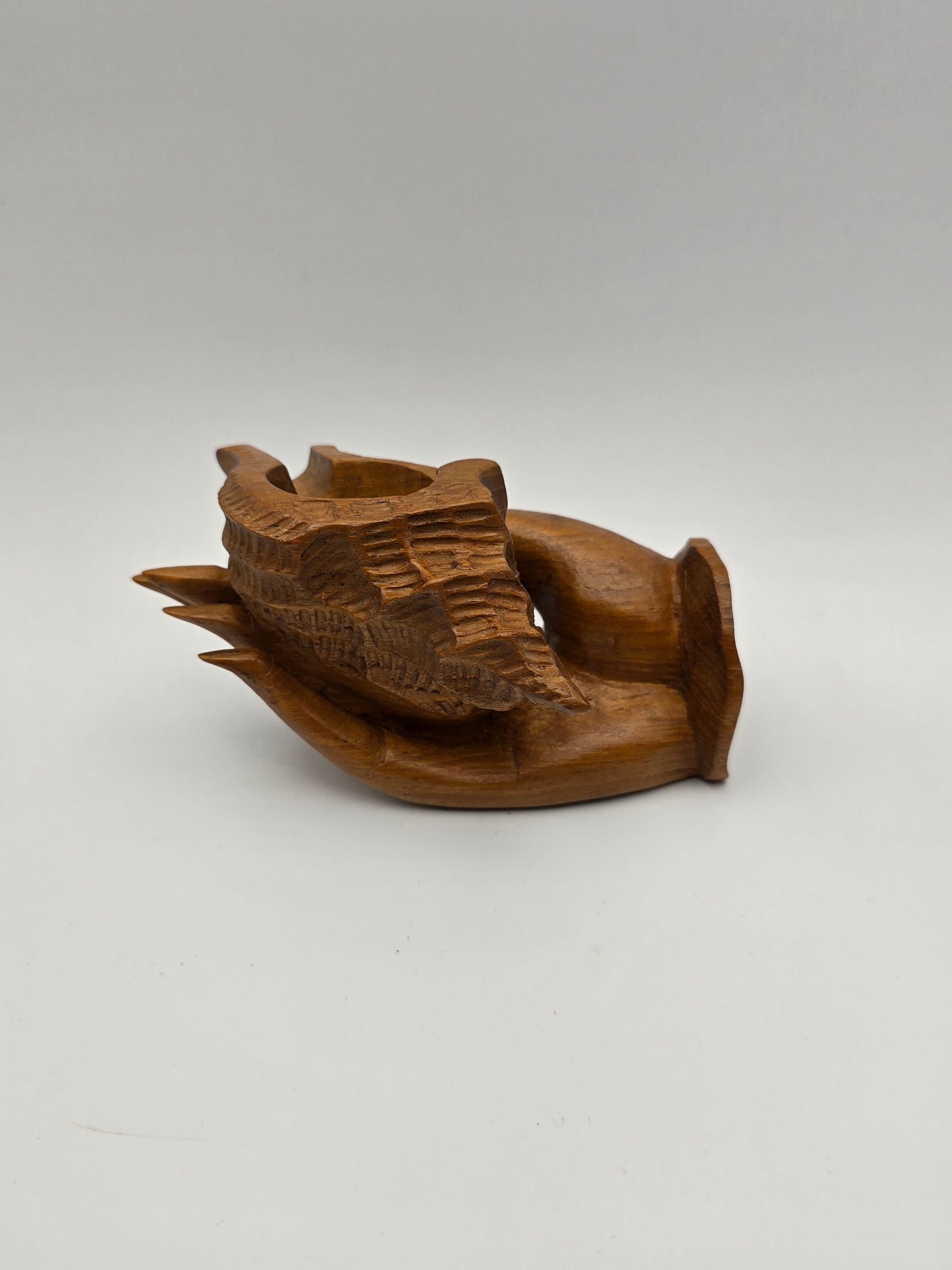 The Shell With Ashtray Design Inside Woman Hand. Beautiful Handmade Wooden Art.