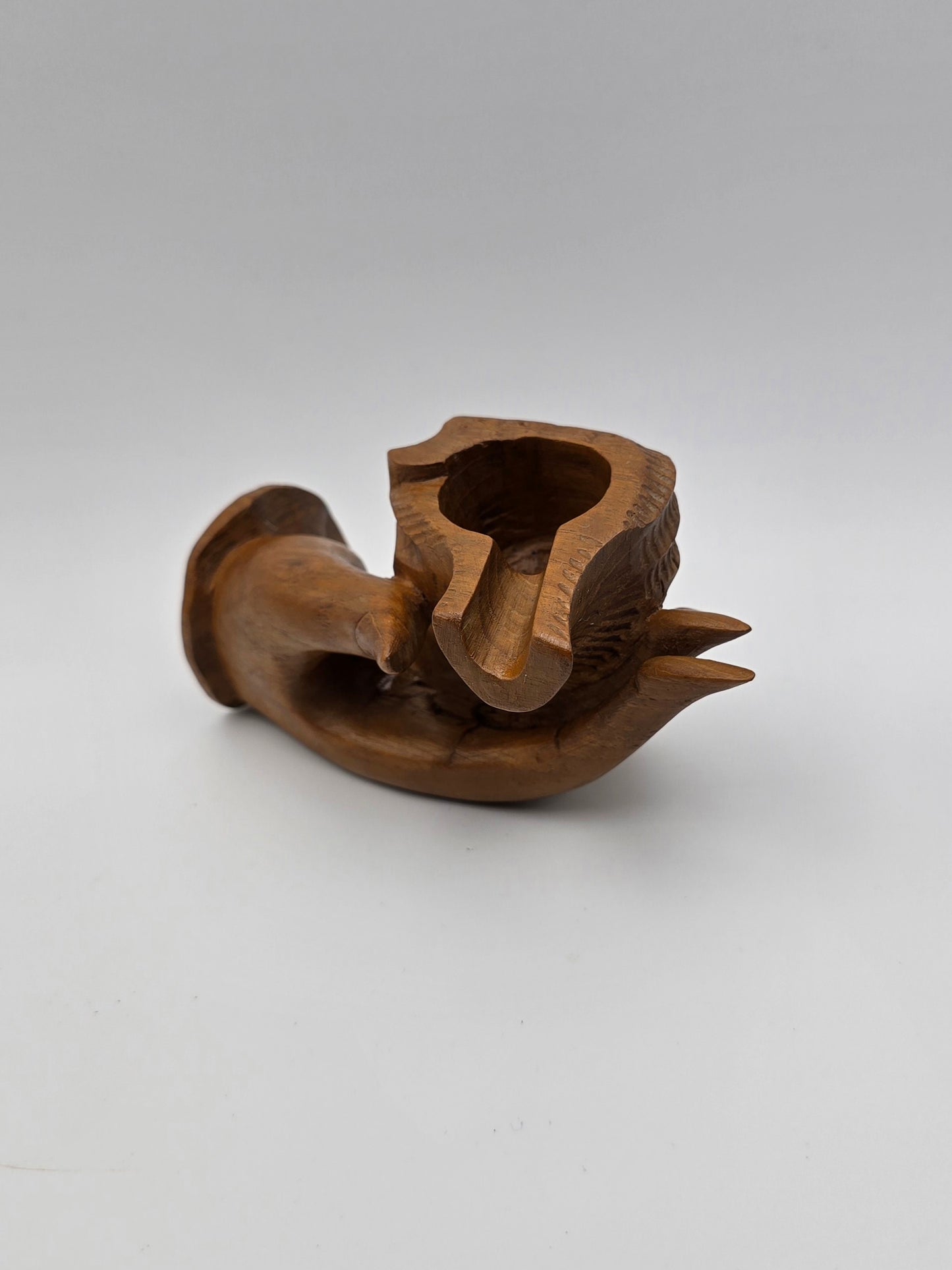 The Shell With Ashtray Design Inside Woman Hand. Beautiful Handmade Wooden Art.