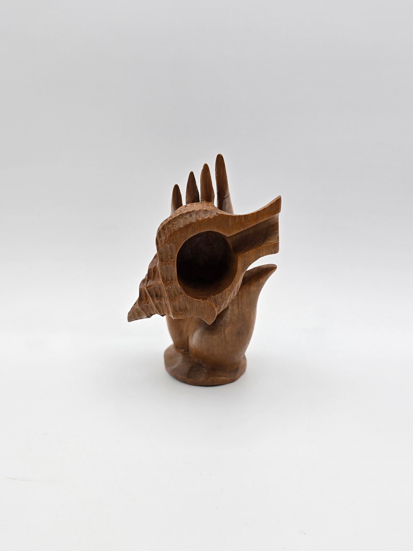 The Shell With Ashtray Design Inside Woman Hand. Beautiful Handmade Wooden Art.