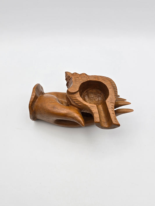 The Shell With Ashtray Design Inside Woman Hand. Beautiful Handmade Wooden Art.