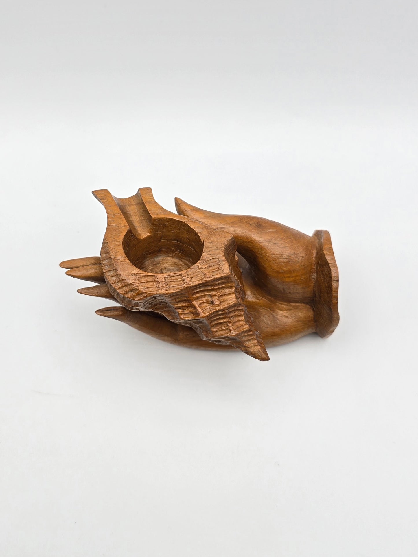 The Shell With Ashtray Design Inside Woman Hand. Beautiful Handmade Wooden Art.