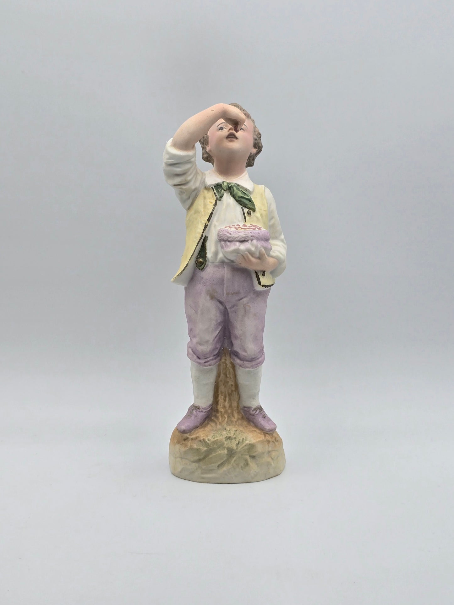 Vintage Gebruder Heubach Figurine. Young Boy Eating Fruit From His Bag.