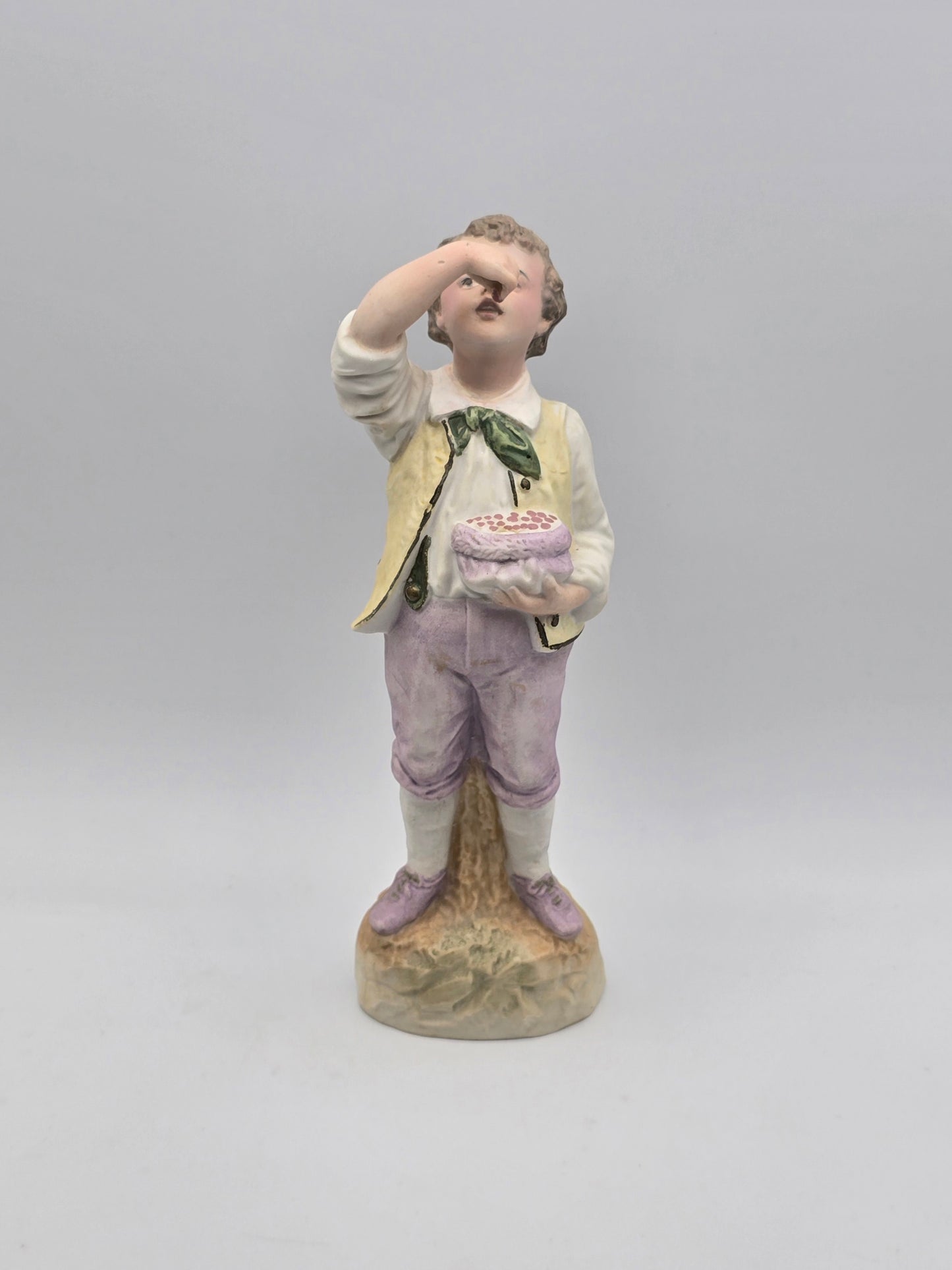 Vintage Gebruder Heubach Figurine. Young Boy Eating Fruit From His Bag.