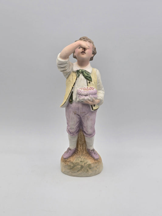 Vintage Gebruder Heubach Figurine. Young Boy Eating Fruit From His Bag.