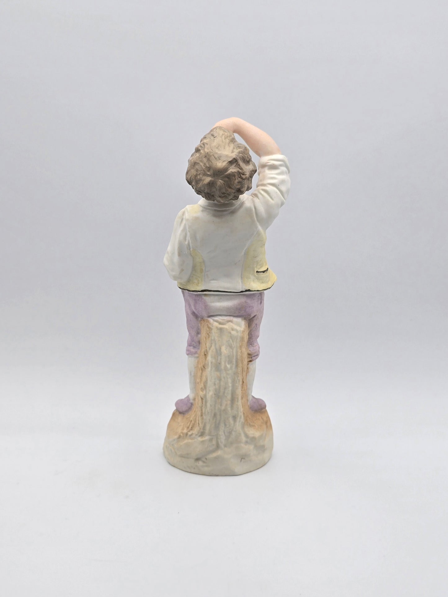 Vintage Gebruder Heubach Figurine. Young Boy Eating Fruit From His Bag.