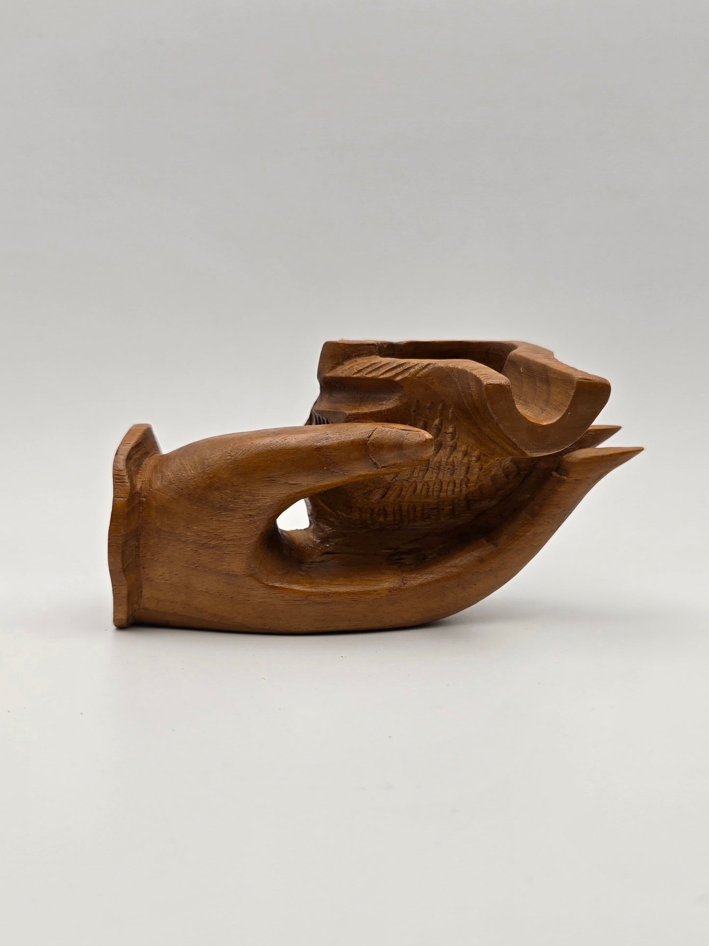 The Shell With Ashtray Design Inside Woman Hand. Beautiful Handmade Wooden Art.