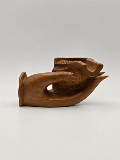 The Shell With Ashtray Design Inside Woman Hand. Beautiful Handmade Wooden Art.