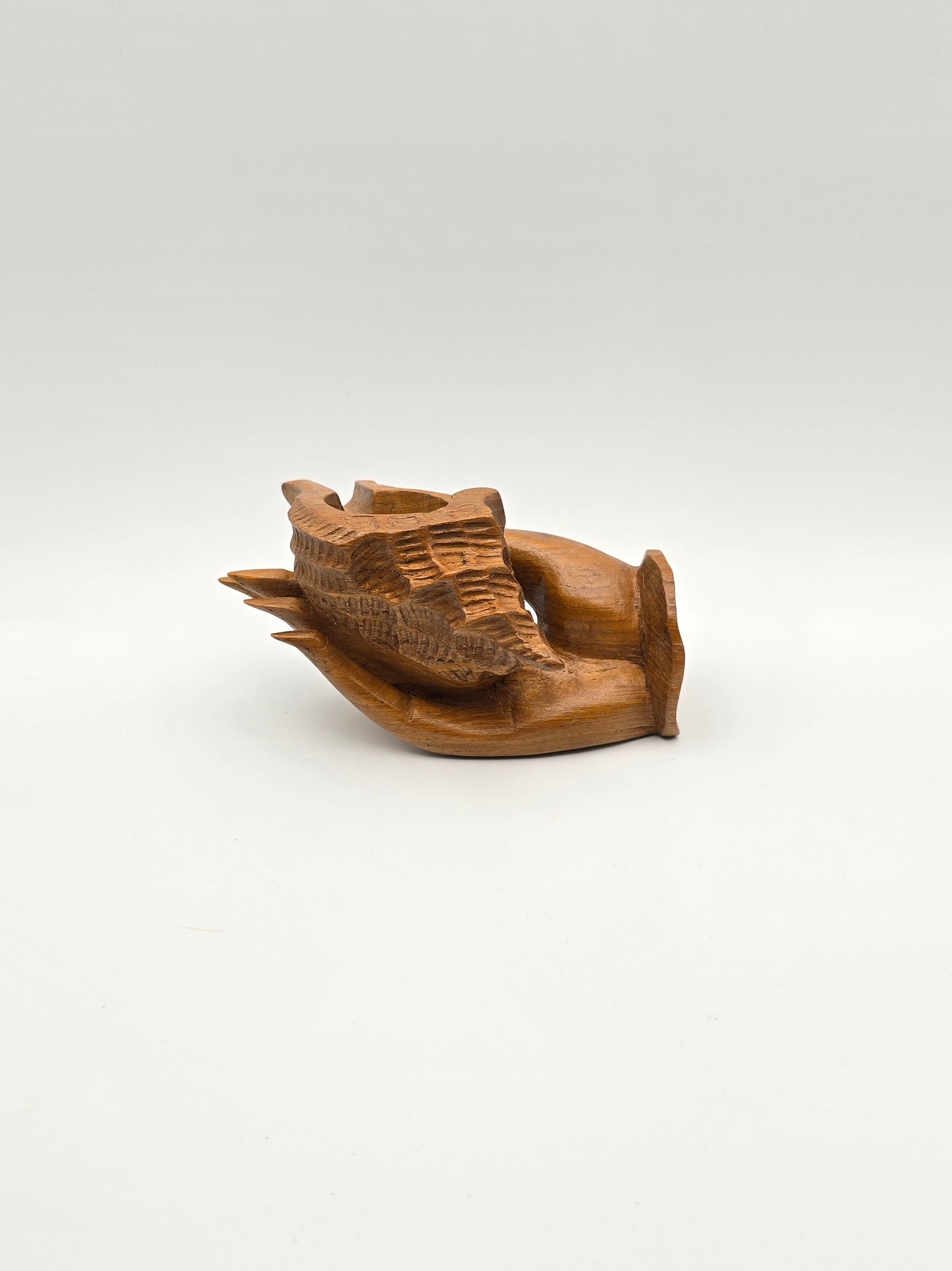 The Shell With Ashtray Design Inside Woman Hand. Beautiful Handmade Wooden Art.