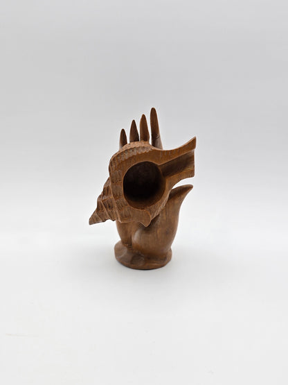 The Shell With Ashtray Design Inside Woman Hand. Beautiful Handmade Wooden Art.