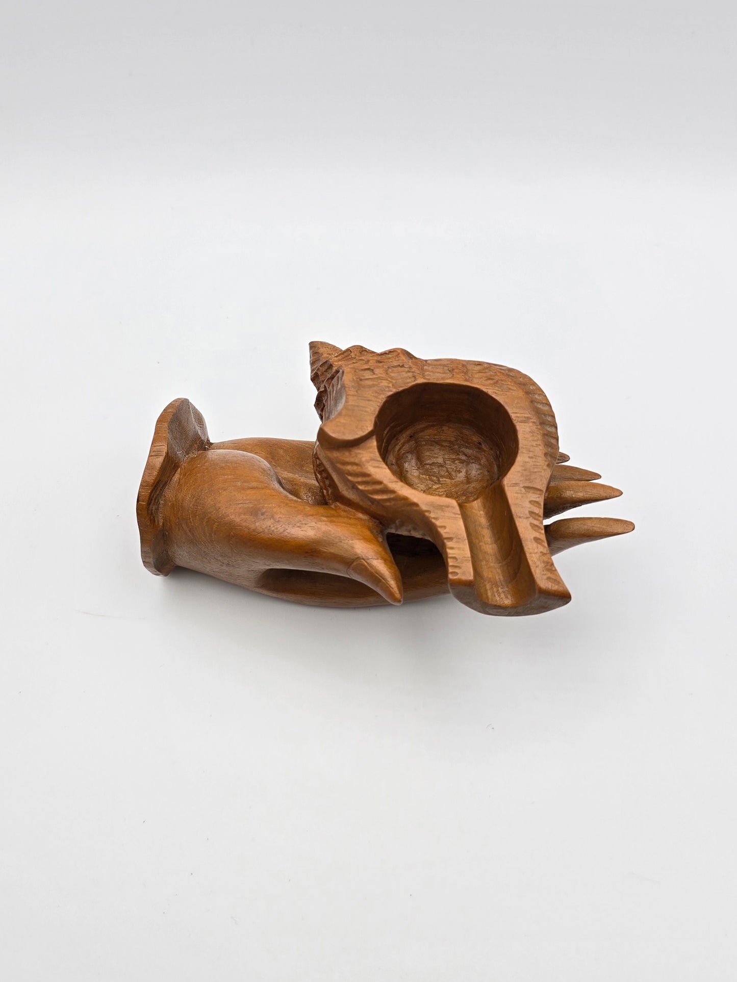 The Shell With Ashtray Design Inside Woman Hand. Beautiful Handmade Wooden Art.