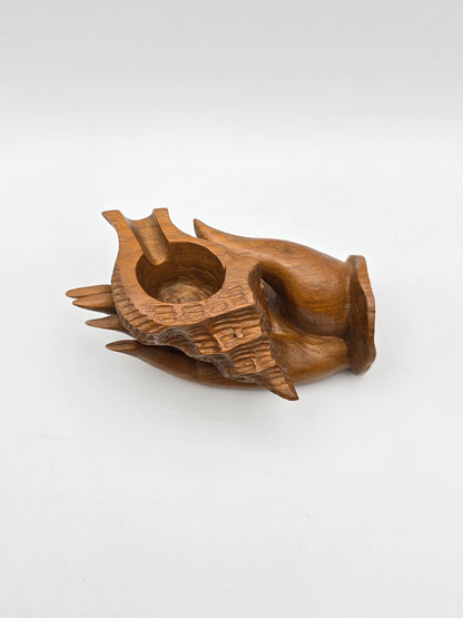 The Shell With Ashtray Design Inside Woman Hand. Beautiful Handmade Wooden Art.