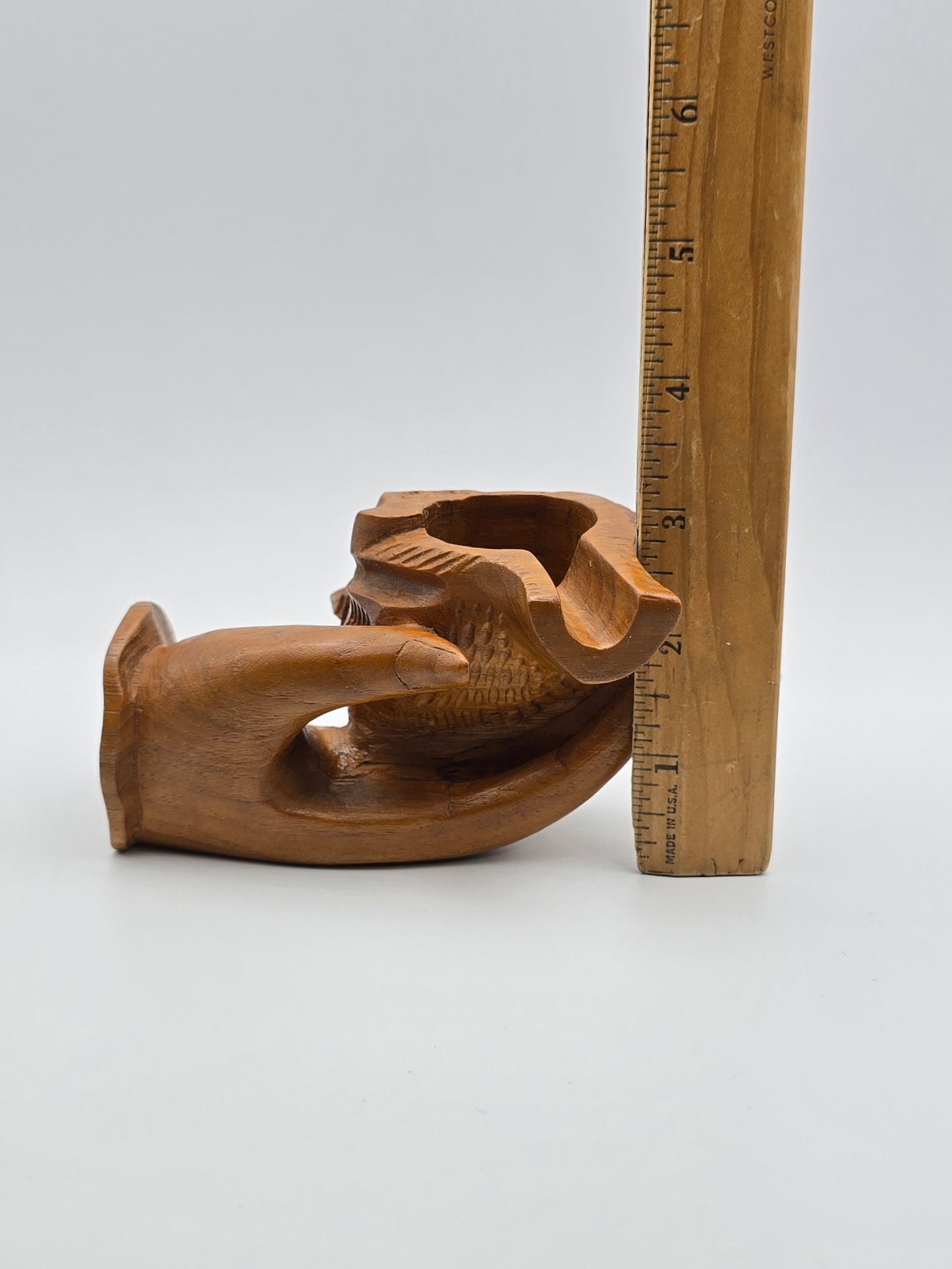 The Shell With Ashtray Design Inside Woman Hand. Beautiful Handmade Wooden Art.