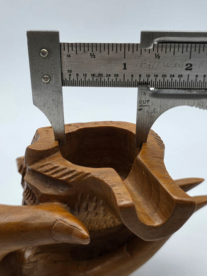 The Shell With Ashtray Design Inside Woman Hand. Beautiful Handmade Wooden Art.