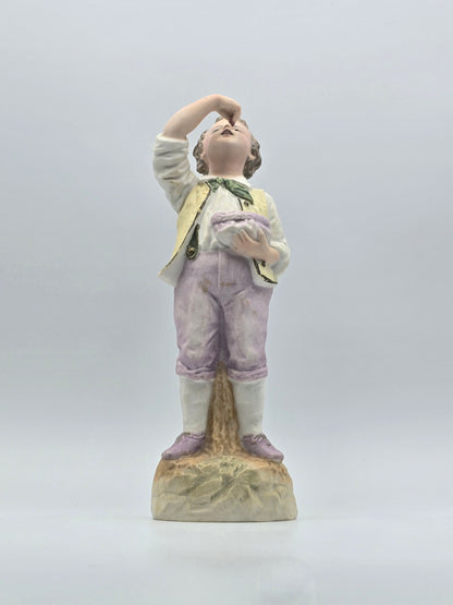 Vintage Gebruder Heubach Figurine. Young Boy Eating Fruit From His Bag.