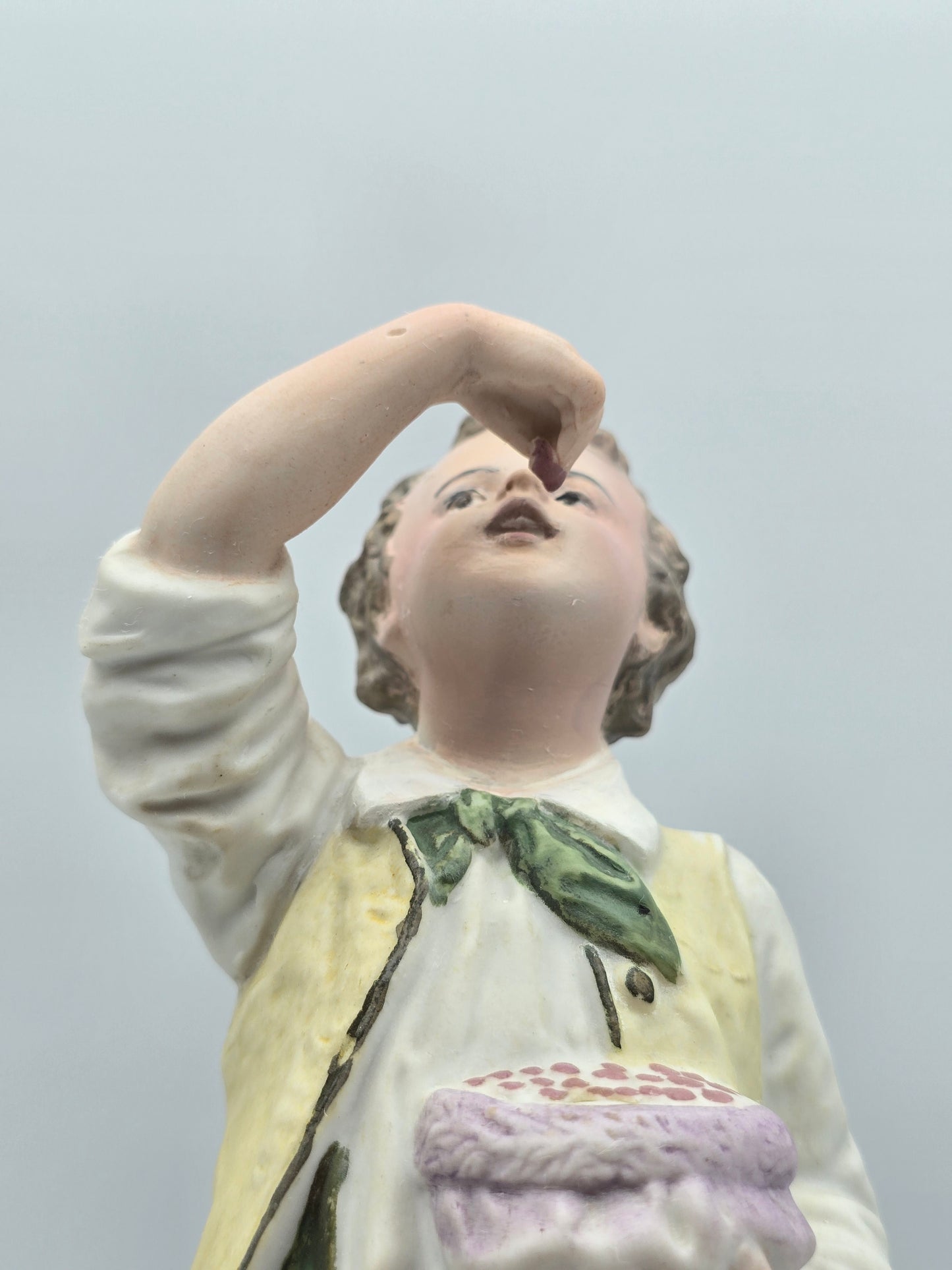 Vintage Gebruder Heubach Figurine. Young Boy Eating Fruit From His Bag.