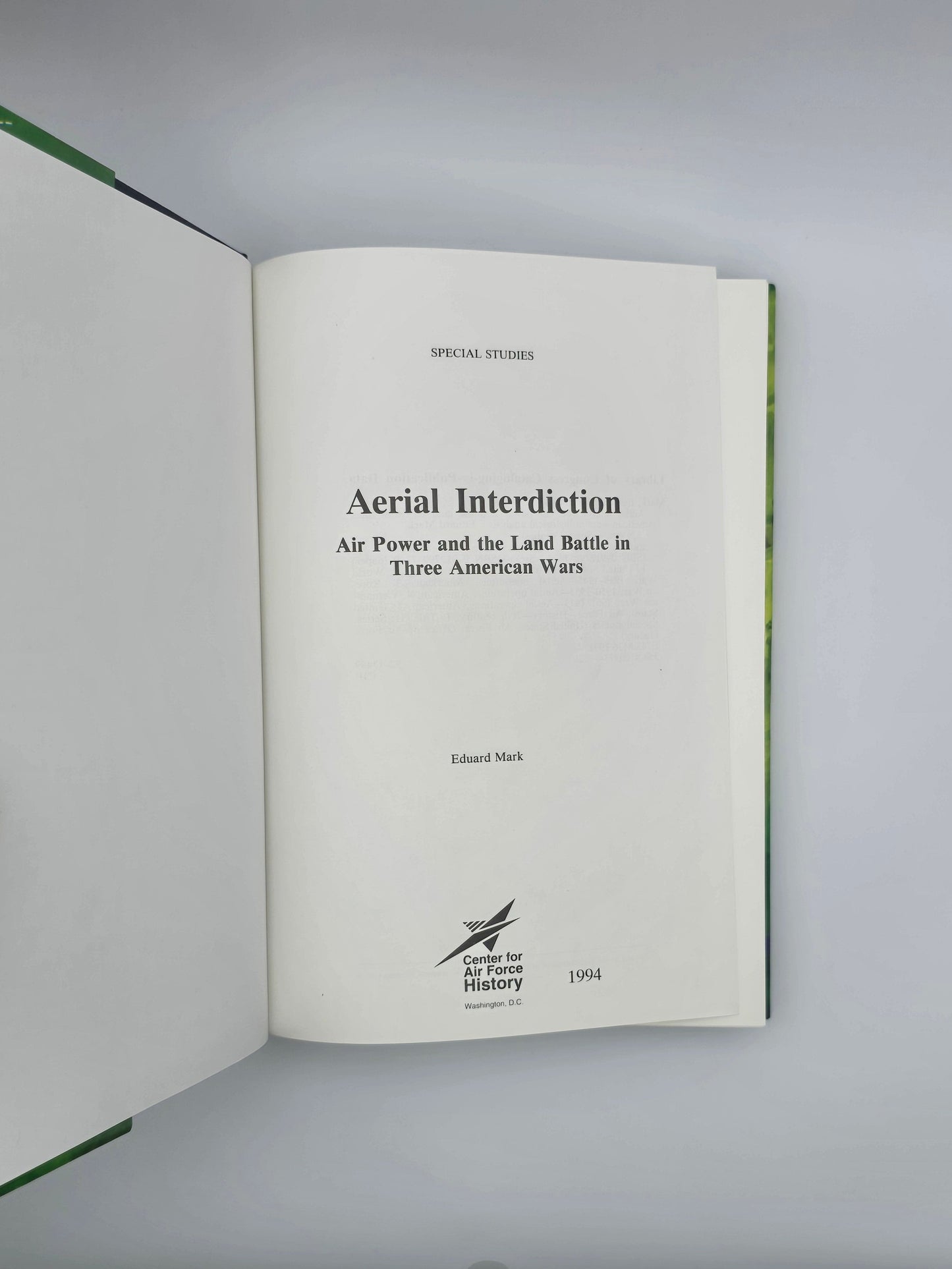 Open book with text on a gray background