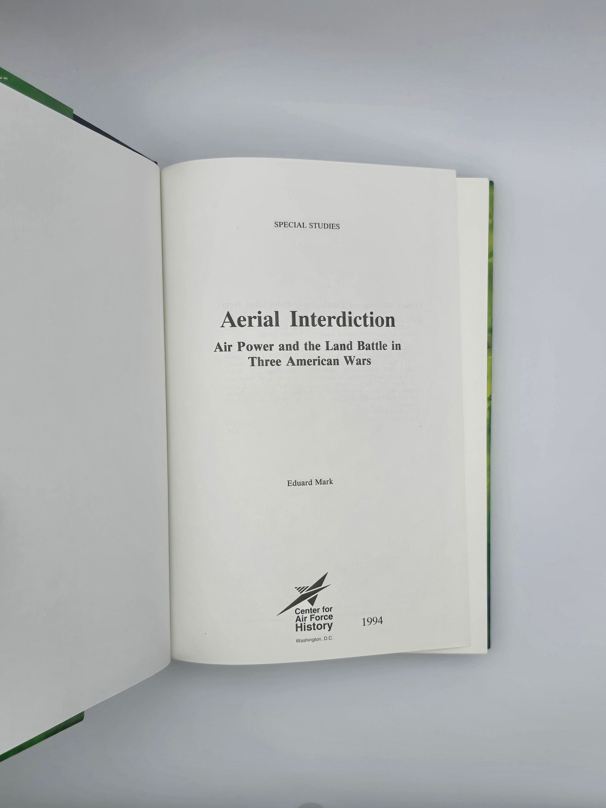 Open book with text on a gray background